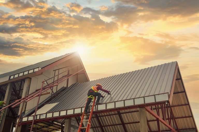 Roofer,Construction,Worker,Install,New,Roof,roofing,Tools,On,During,Sunset,electric